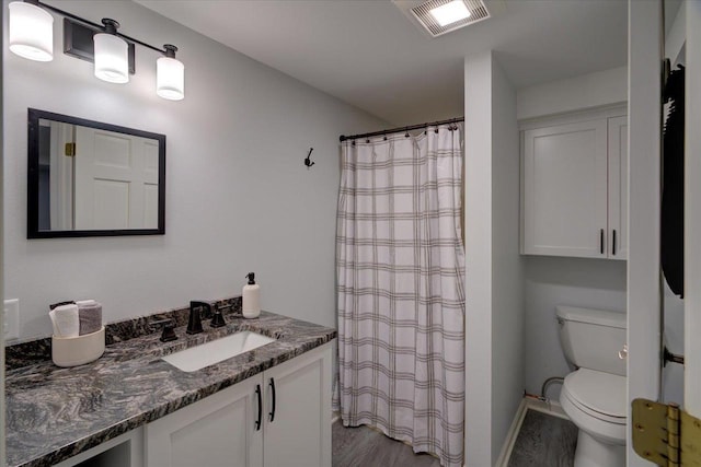 101 Everglade Dr, Madison, WI 53717 - full bath with toilet, vanity, wood finished floors, and a shower with curtain