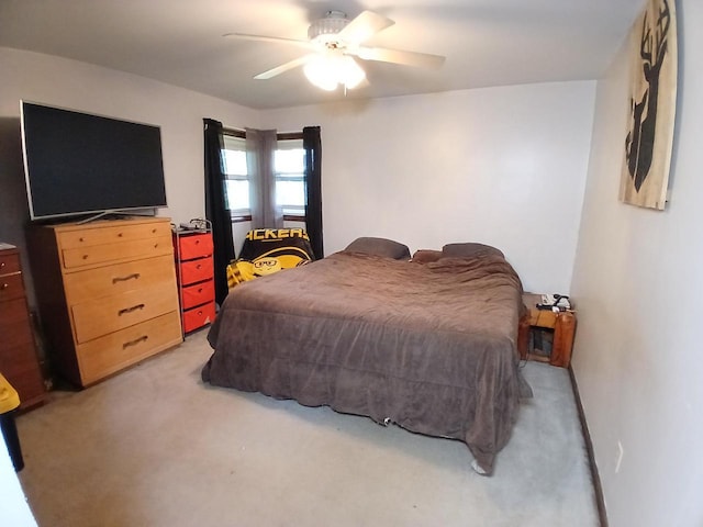 2048 County Road Q, Pound, WI 54161 - bedroom with light carpet and ceiling fan