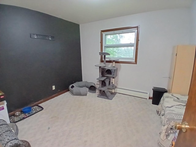 2048 County Road Q, Pound, WI 54161 - exercise room with a baseboard heating unit, carpet, and baseboards