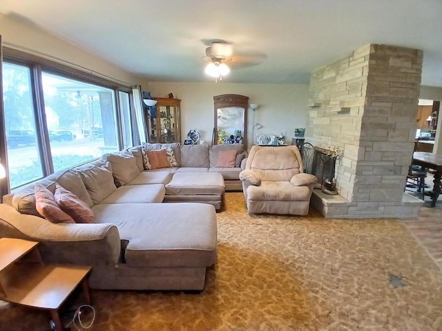 2048 County Road Q, Pound, WI 54161 - living area featuring a ceiling fan and a stone fireplace