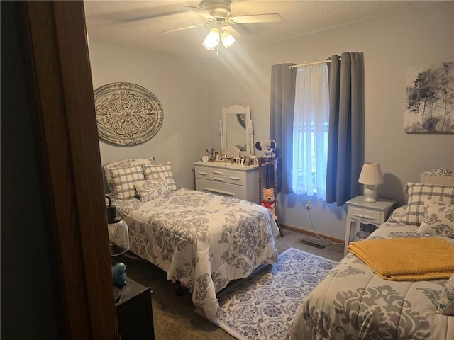 318 Frenette Dr Unit 2, Chippewa Falls, WI 54729 - carpeted bedroom featuring a ceiling fan, a textured ceiling, and baseboards