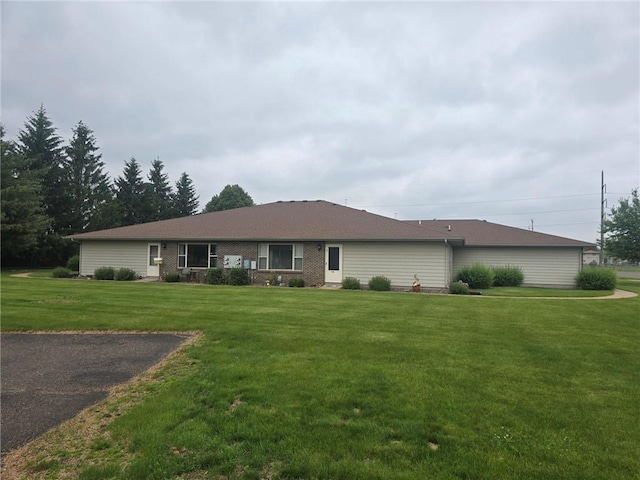 318 Frenette Dr Unit 2, Chippewa Falls, WI 54729 - ranch-style home with a front yard