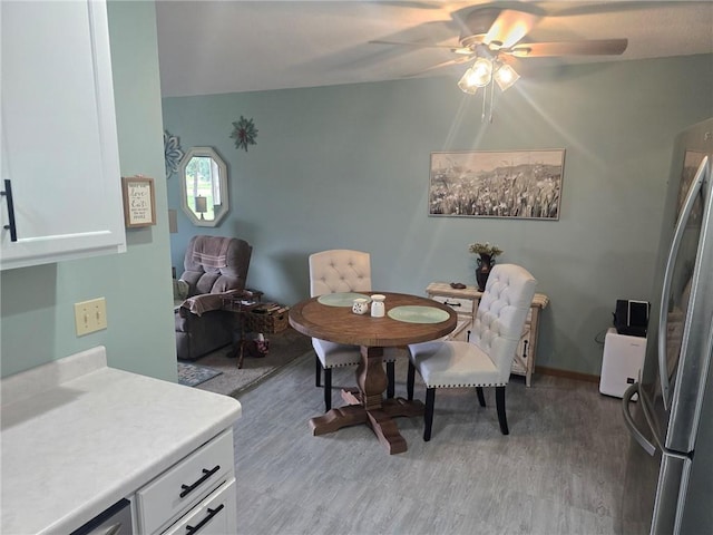 318 Frenette Dr Unit 2, Chippewa Falls, WI 54729 - dining space with ceiling fan and light wood finished floors