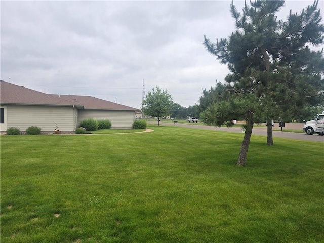 318 Frenette Dr Unit 2, Chippewa Falls, WI 54729 - view of grassy yard