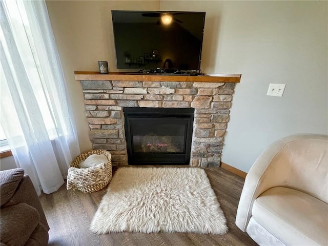 4010 Nicholas Dr, Menomonie, WI 54751 - detailed view of wood finished floors, a fireplace, and baseboards