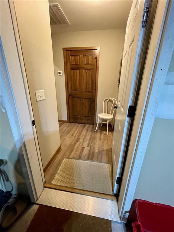 4010 Nicholas Dr, Menomonie, WI 54751 - corridor with wood finished floors