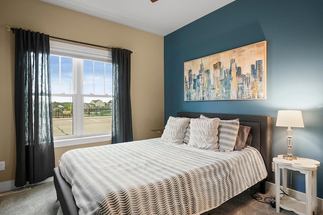 6249 Fountainhead Cir, Deforest, WI 53532 - carpeted bedroom with baseboards