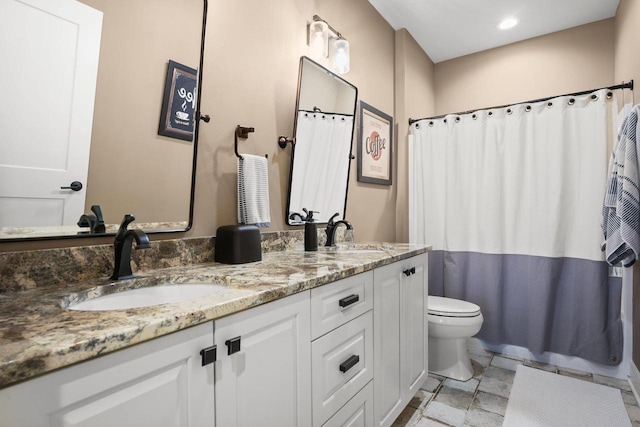 6249 Fountainhead Cir, Deforest, WI 53532 - full bath featuring toilet, double vanity, a shower with curtain, and recessed lighting