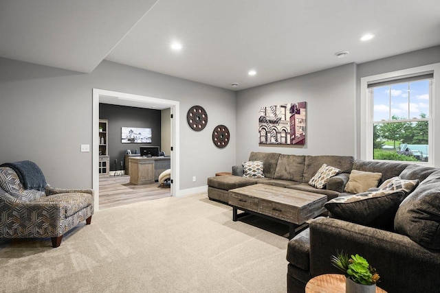 6249 Fountainhead Cir, Deforest, WI 53532 - living area featuring recessed lighting, light colored carpet, and baseboards