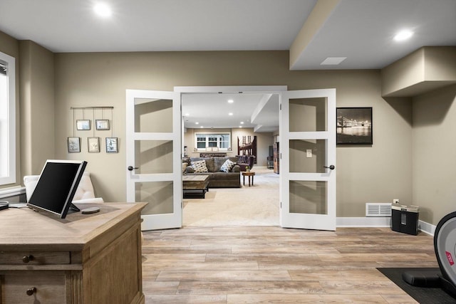 6249 Fountainhead Cir, Deforest, WI 53532 - office space featuring french doors, light wood finished floors, baseboards, and recessed lighting