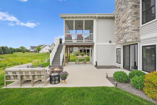 6249 Fountainhead Cir, Deforest, WI 53532 - view of patio / terrace with stairs, ceiling fan, and an outdoor living space with a fire pit