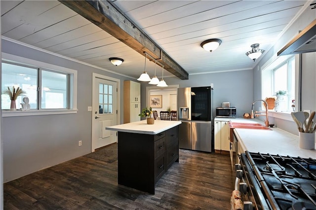 54675 Cudworth Ave, Grand View, WI 54839 - kitchen with appliances with stainless steel finishes, custom range hood, dark cabinetry, light countertops, and healthy amount of natural light