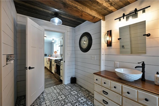 54675 Cudworth Ave, Grand View, WI 54839 - bathroom with wooden ceiling, vanity, wood walls, and tile patterned flooring