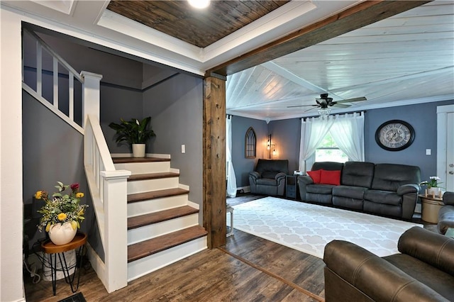 54675 Cudworth Ave, Grand View, WI 54839 - living area with stairway, dark wood finished floors, a ceiling fan, baseboards, and wooden ceiling with exposed beams