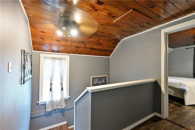 54675 Cudworth Ave, Grand View, WI 54839 - hall with wooden ceiling, dark wood-style floors, baseboards, lofted ceiling, and an upstairs landing