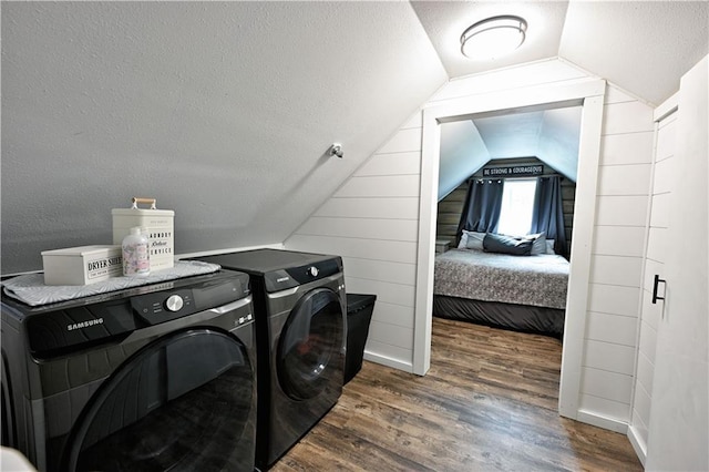 54675 Cudworth Ave, Grand View, WI 54839 - washroom with washing machine and clothes dryer, wood finished floors, and a textured ceiling
