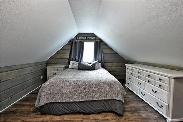 54675 Cudworth Ave, Grand View, WI 54839 - bedroom with wooden walls, dark wood finished floors, and vaulted ceiling