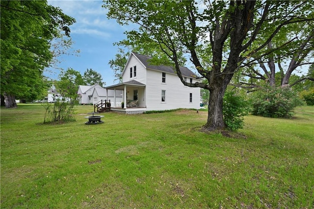54675 Cudworth Ave, Grand View, WI 54839 - view of green lawn featuring a fire pit