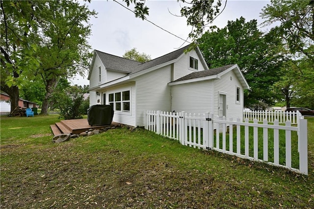 54675 Cudworth Ave, Grand View, WI 54839 - view of home's exterior with a wooden deck and a shingled roof