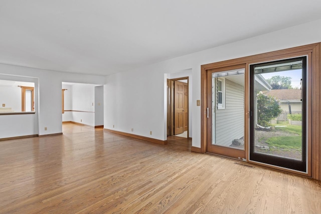 1615 Hickory St, South Milwaukee, WI 53172 - empty room featuring light wood-style flooring and baseboards