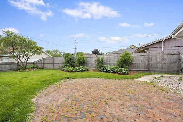 1615 Hickory St, South Milwaukee, WI 53172 - fenced backyard with a patio area