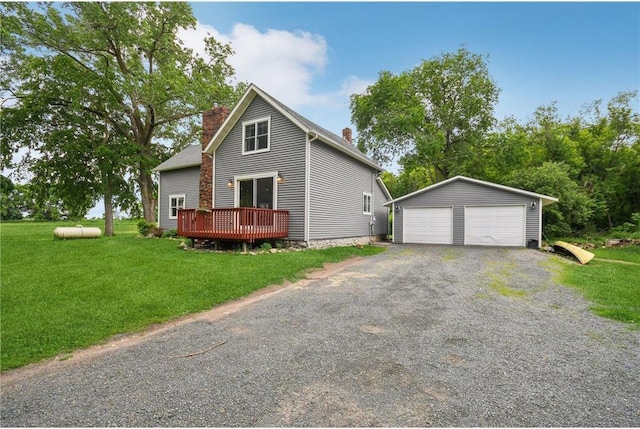 2256 40th Ave Unit X, Osceola, WI 54020 - view of front of house with an outdoor structure, a chimney, a garage, a front lawn, and a deck