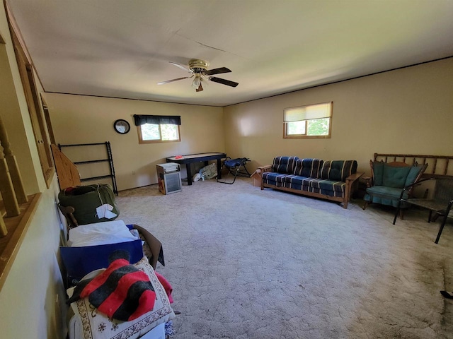 W2671 State Highway 64 E, White Lake, WI 54491 - living area with healthy amount of natural light, carpet flooring, and a ceiling fan