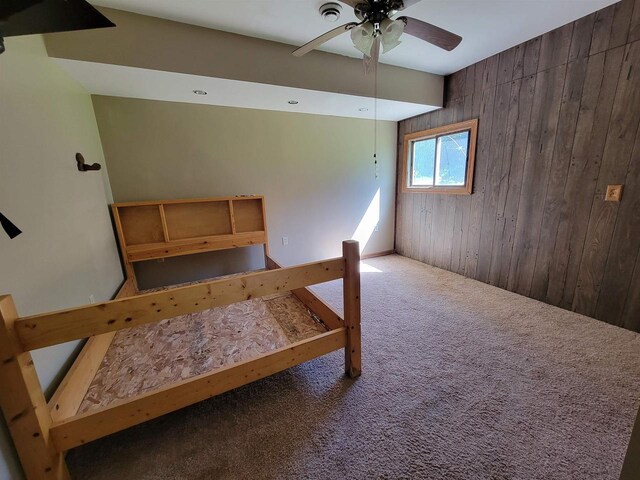 W2671 State Highway 64 E, White Lake, WI 54491 - bedroom with carpet floors and wooden walls
