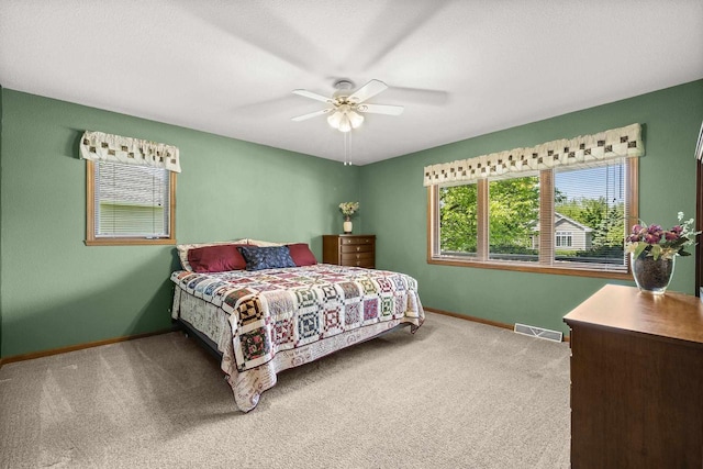 N7844 Lake Shore Ln, Sherwood, WI 54169 - bedroom featuring baseboards, carpet flooring, and ceiling fan