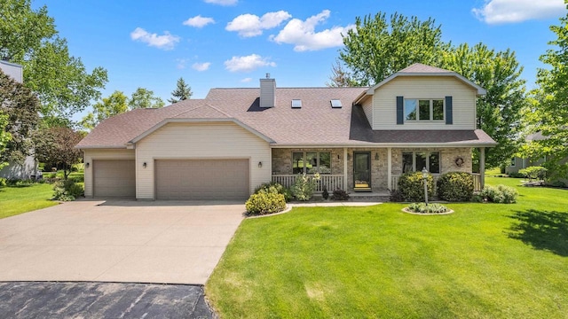 N7844 Lake Shore Ln, Sherwood, WI 54169 - view of front of property with a garage, concrete driveway, a front yard, and a porch
