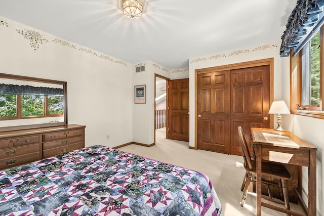 N7844 Lake Shore Ln, Sherwood, WI 54169 - bedroom with light colored carpet, a closet, and baseboards