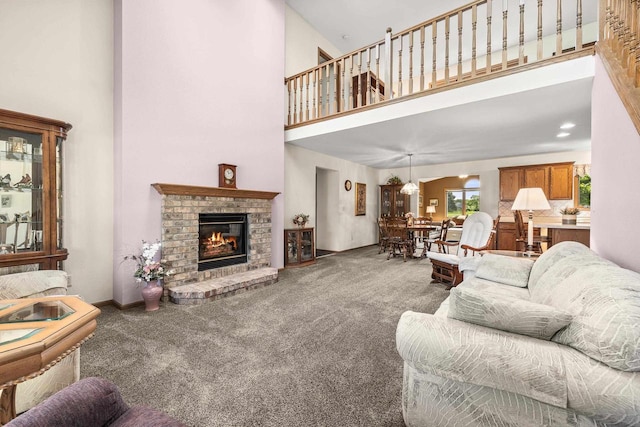 N7844 Lake Shore Ln, Sherwood, WI 54169 - carpeted living room with a high ceiling and a fireplace