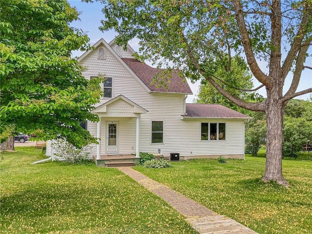 231 S Woodworth St, Elmwood, WI 54740 - victorian home featuring a front lawn and a shingled roof