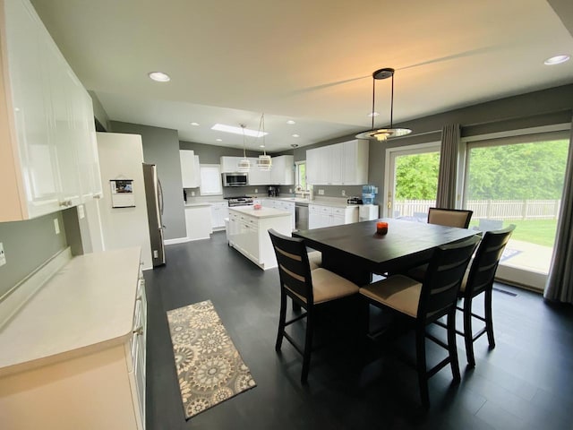 540 W Manor Cir, Bayside, WI 53217 - dining area featuring dark wood-type flooring and recessed lighting
