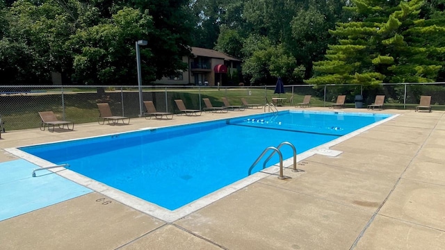 5313 Brody Dr Unit 202, Madison, WI 53705 - community pool with a patio area and view of scattered trees