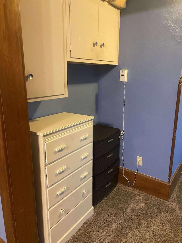 352 N Harrison St, Lancaster, WI 53813 - bedroom featuring dark carpet and baseboards