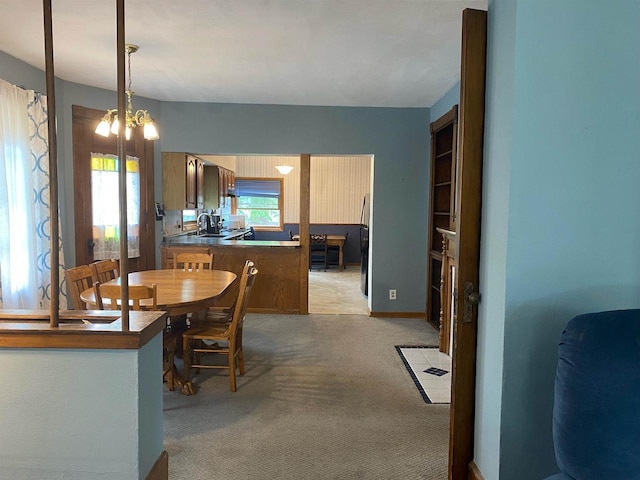 352 N Harrison St, Lancaster, WI 53813 - dining room featuring light colored carpet and a chandelier