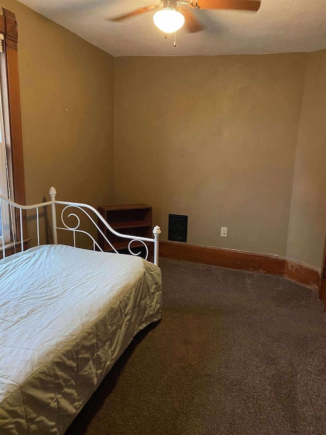 352 N Harrison St, Lancaster, WI 53813 - bedroom with carpet and a ceiling fan