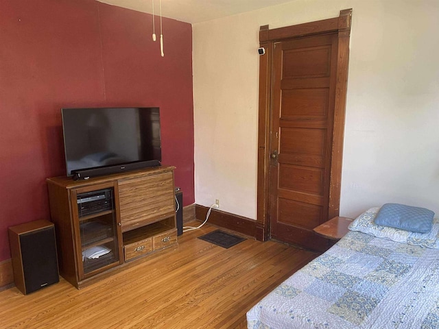 352 N Harrison St, Lancaster, WI 53813 - bedroom with light wood finished floors and baseboards