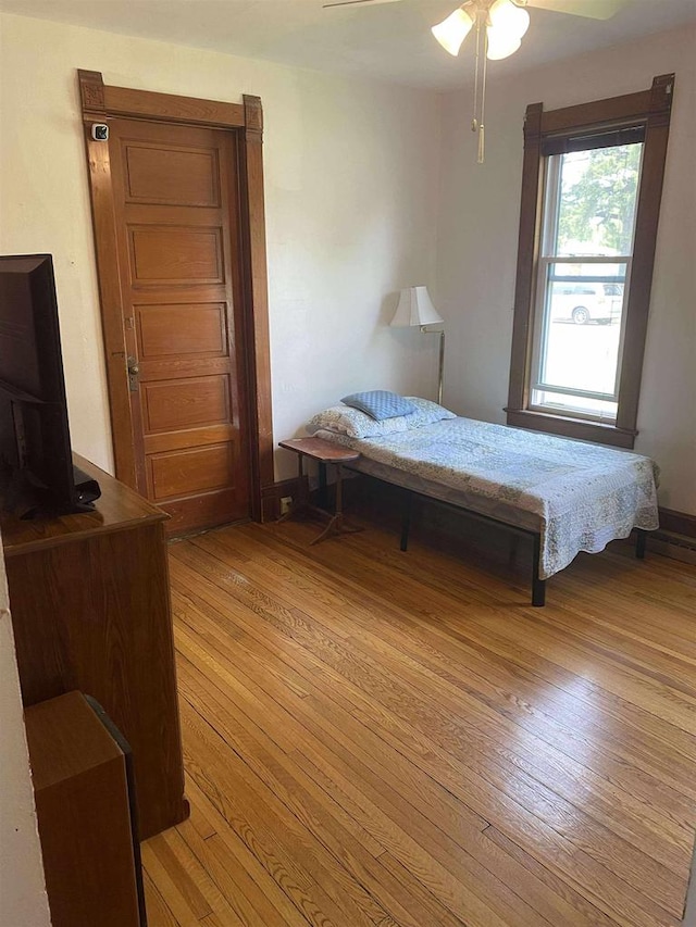 352 N Harrison St, Lancaster, WI 53813 - bedroom featuring light wood finished floors and a ceiling fan