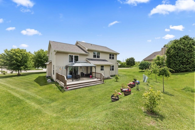 104 Chapel Hill Dr, Johnson Creek, WI 53038 - rear view of property featuring a gazebo, a yard, a wooden deck, and an outdoor living space