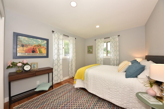 7062 N 46th St, Milwaukee, WI 53223 - bedroom featuring wood finished floors, multiple windows, and recessed lighting