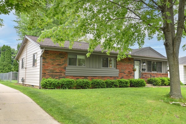 7062 N 46th St, Milwaukee, WI 53223 - ranch-style home with board and batten siding and brick siding