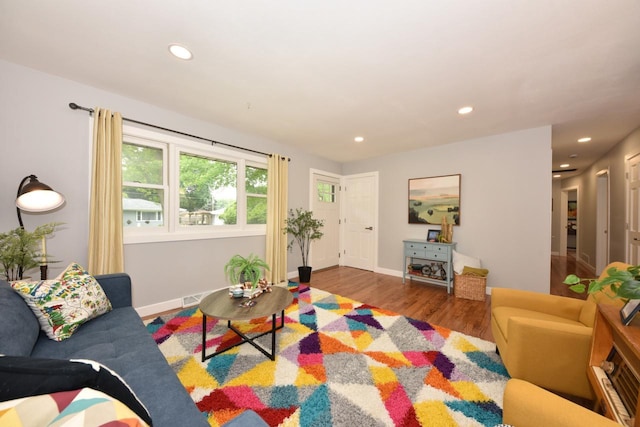 7062 N 46th St, Milwaukee, WI 53223 - living room featuring wood finished floors and recessed lighting