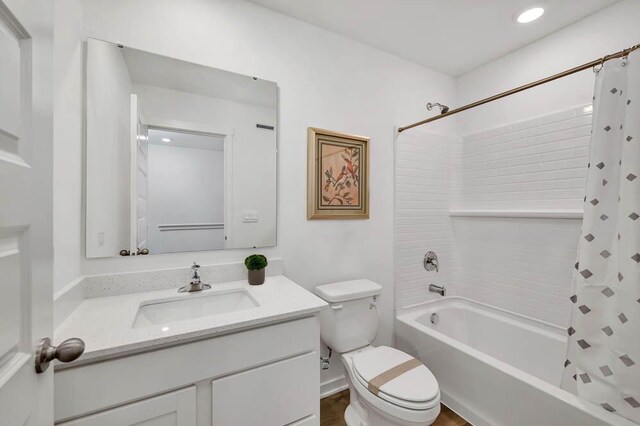 1104 58th Rd, Union Grove, WI 53182 - full bathroom with vanity, shower / bath combo with shower curtain, and toilet
