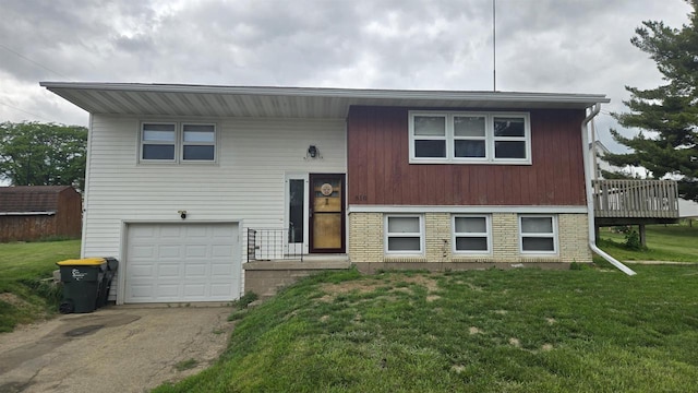 510 N Monroe St, Lancaster, WI 53813 - split foyer home featuring a front yard, an attached garage, and driveway