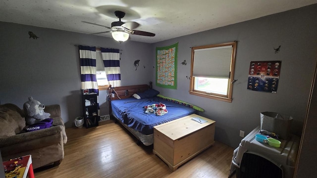 510 N Monroe St, Lancaster, WI 53813 - bedroom with light wood-type flooring and ceiling fan