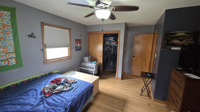 510 N Monroe St, Lancaster, WI 53813 - bedroom featuring light wood-style flooring, ceiling fan, and a closet