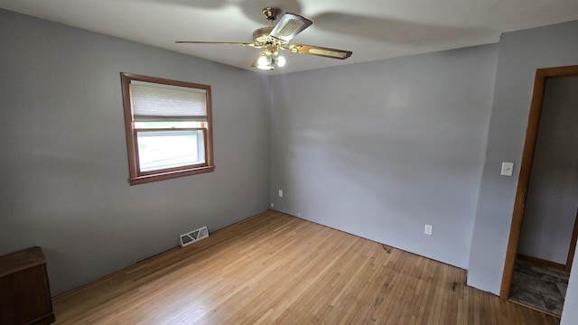 510 N Monroe St, Lancaster, WI 53813 - unfurnished room with wood finished floors and ceiling fan