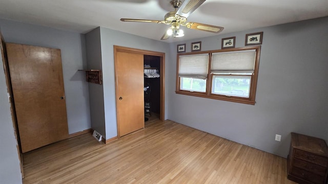 510 N Monroe St, Lancaster, WI 53813 - unfurnished bedroom with light wood-type flooring, a closet, and ceiling fan